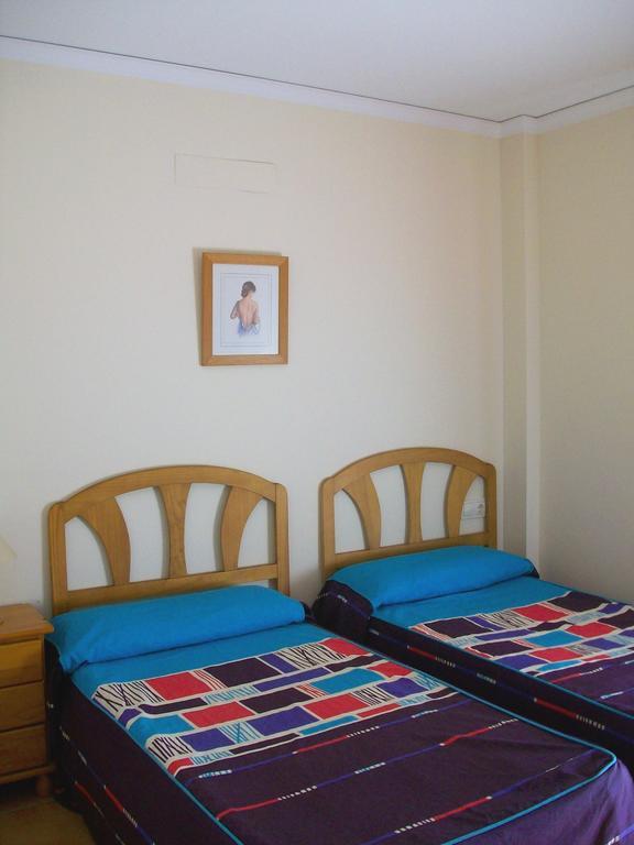 Apartamentos Par Tres - Oliva Nova Pokoj fotografie
